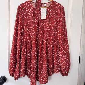 New size XL loose fitting maternity top. Burnt orange, all over floral design